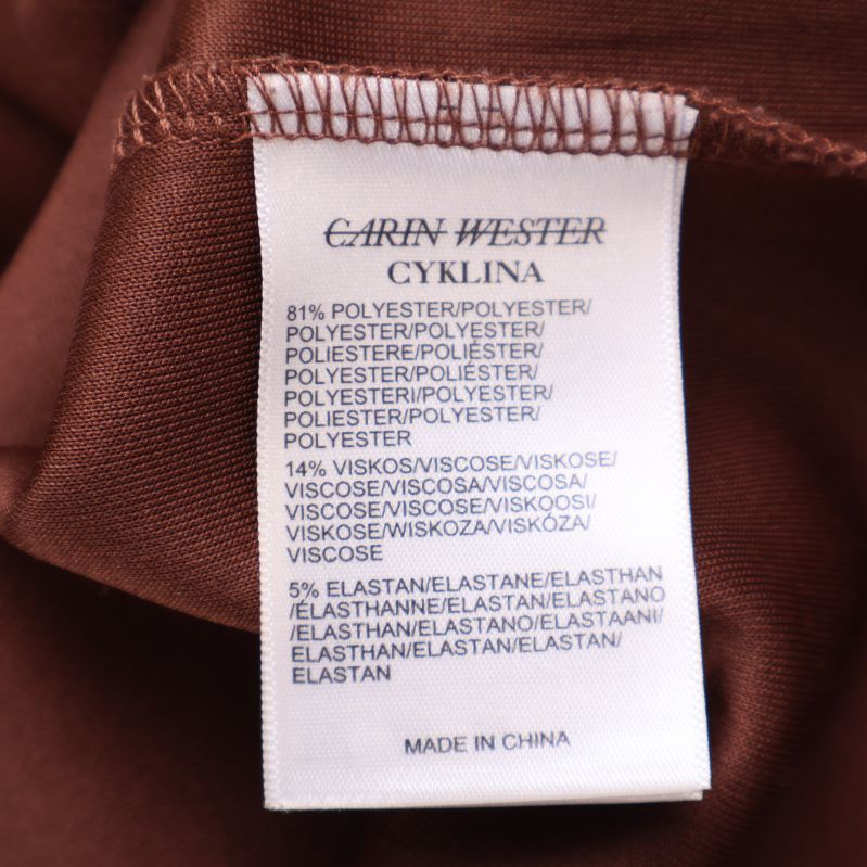 Materiallapp med information om polyester, viskos och elastan