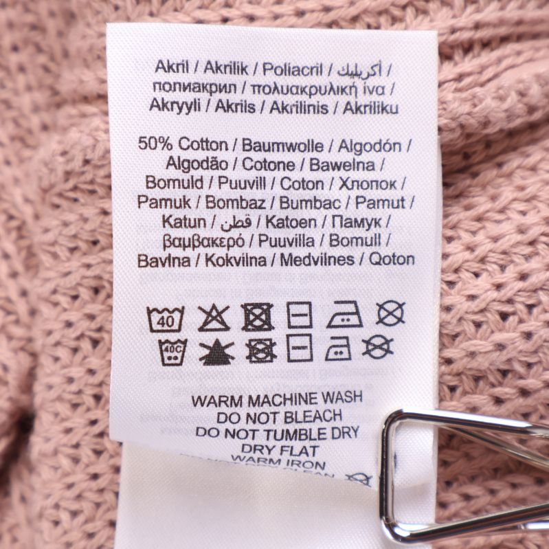 Materiallapp som visar 50% bomull och 50% akryl