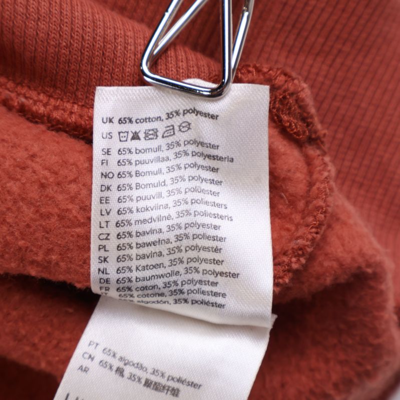 Materiallapp med information om bomull och polyester
