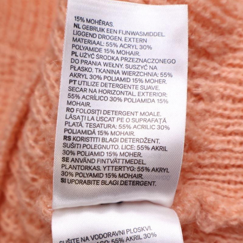 Materiallapp visar blandning av mohair, akryl och polyamid