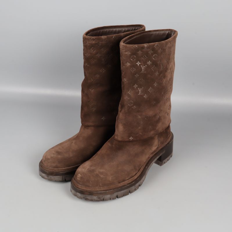 Bruna Louis Vuitton stövlar med mönstrat skaft från sidan