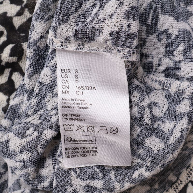 Tvättrådsetikett med materialinformation 100% polyester