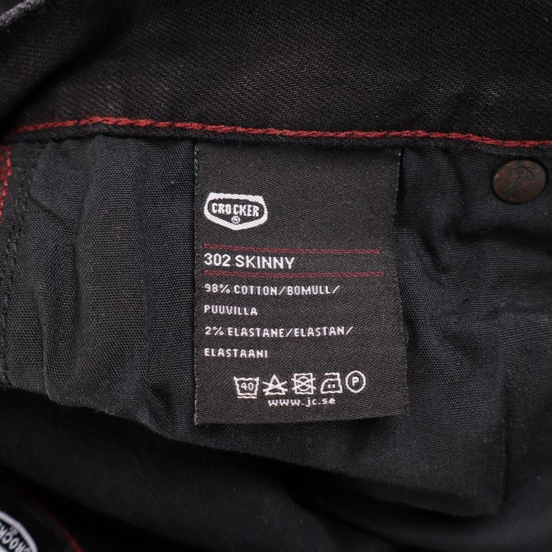 Materialetikett visar blandning bomull och elastan