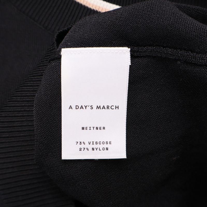 Materiallapp visar 73% viskos 27% nylon