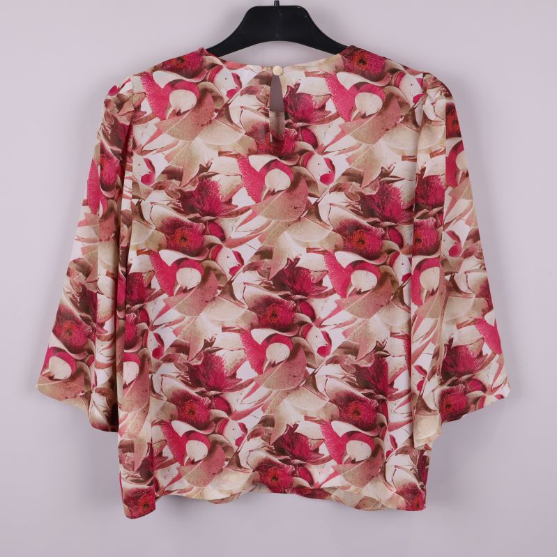 Blommig blus med vida ärmar 
