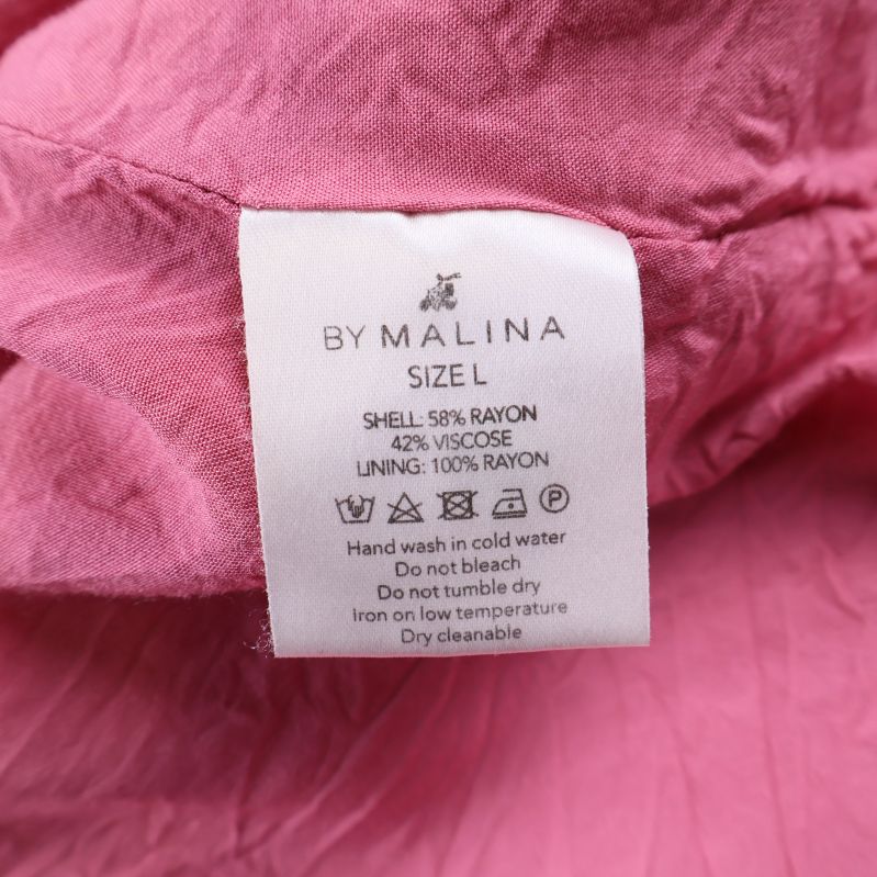 Materialetikett med sammansättning och tvättråd