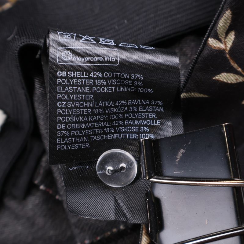 Materialetikett som visar blandmaterial