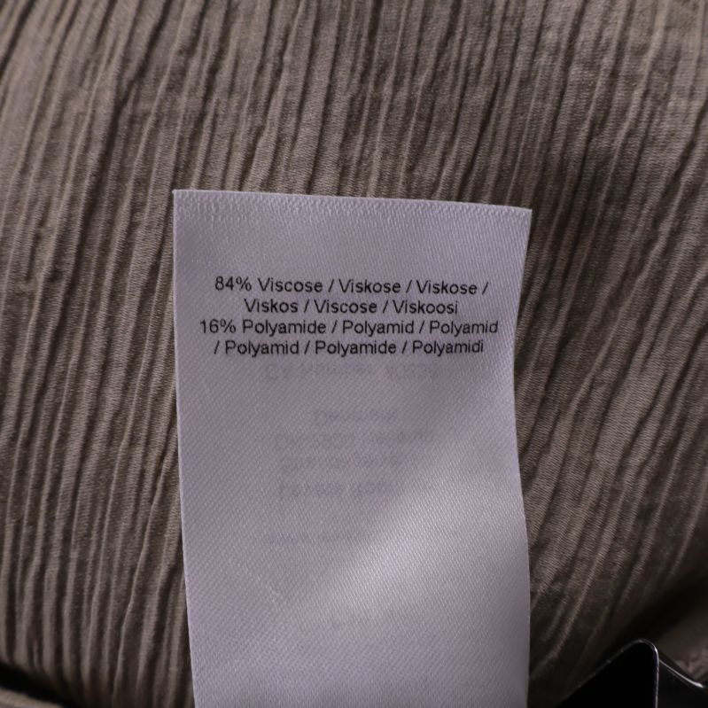 Materiallapp visar 84% viskos och 16% polyamid