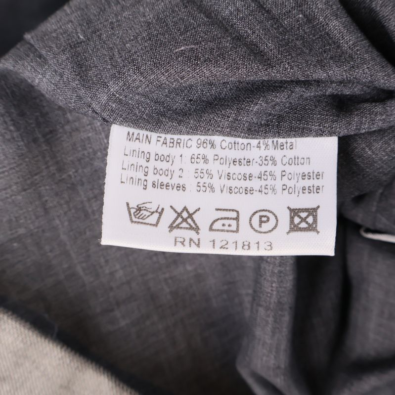 Materialetikett med sammansättning och tvättråd