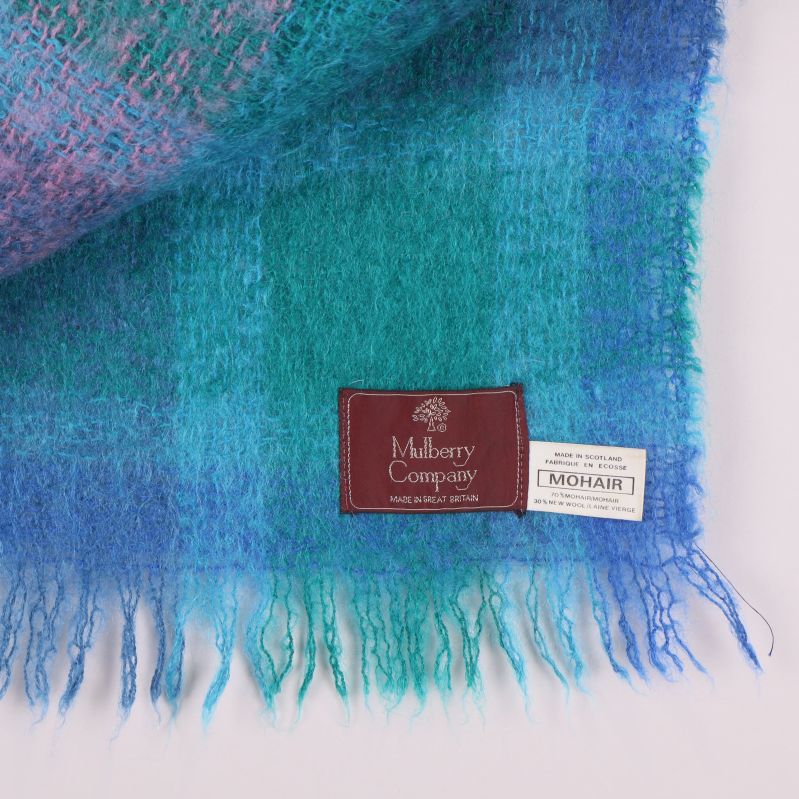 Närbild på etikett med Mulberry Company