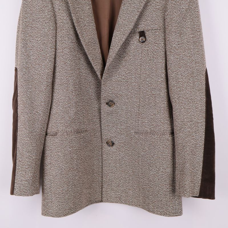 Blazer framtill i helbild med fickor och knappar