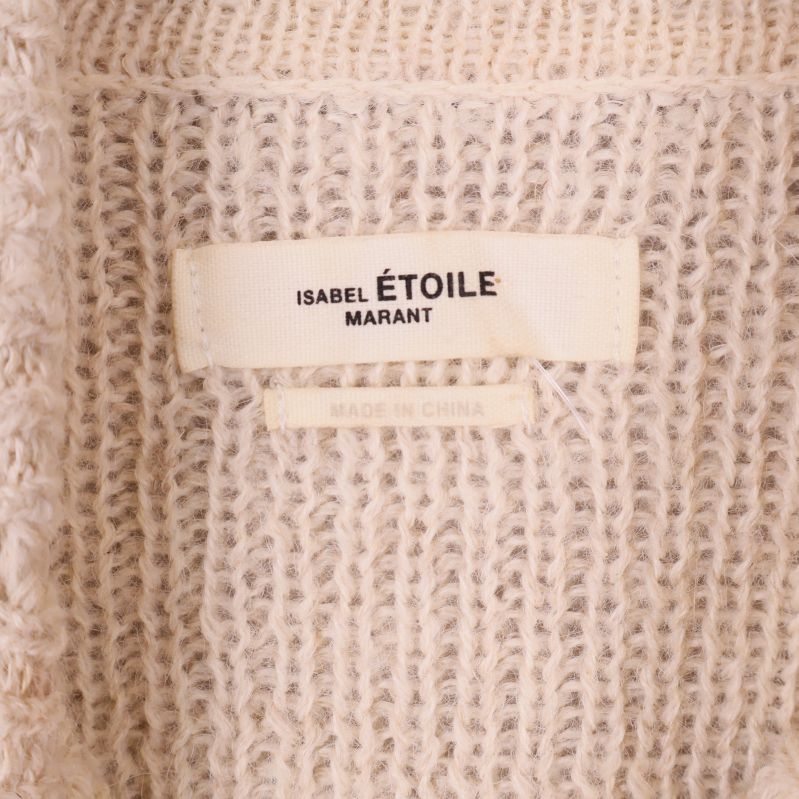 Nära bild på etikett Isabel Étoile Marant inuti tröjan