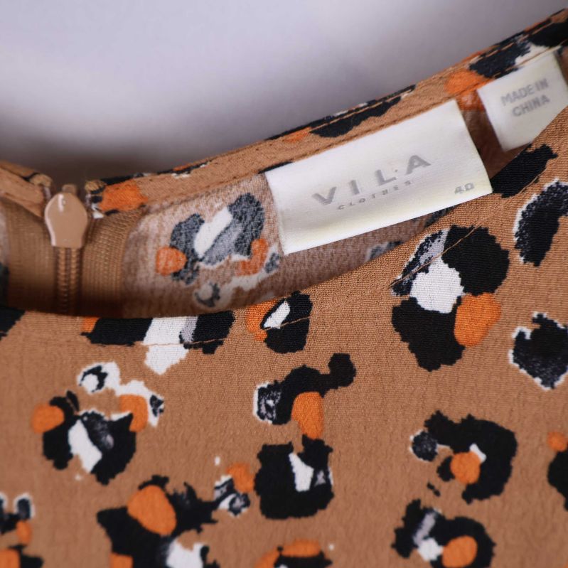 Närbild på VILA-märket