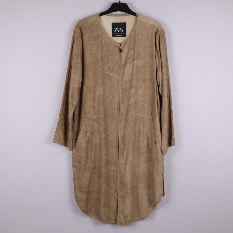 Beige kappa framsida