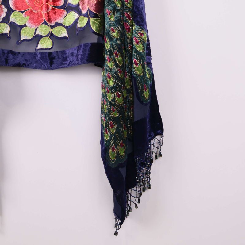 Sjalens kant med fransar och mönster