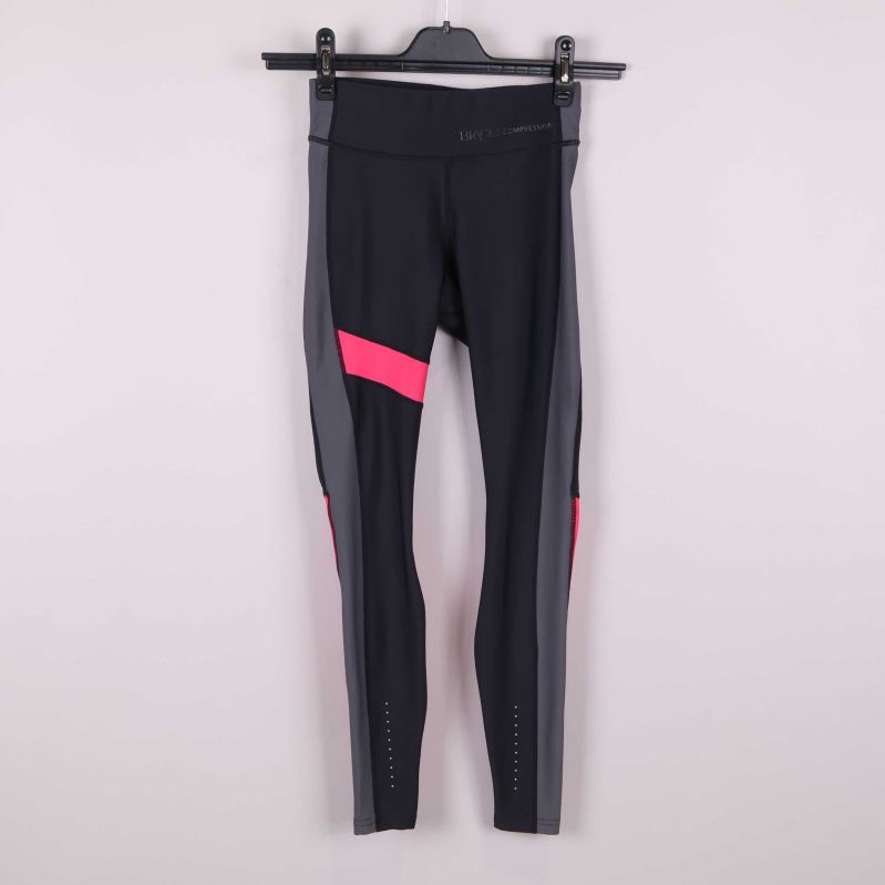 Framsida av tights med färgblock