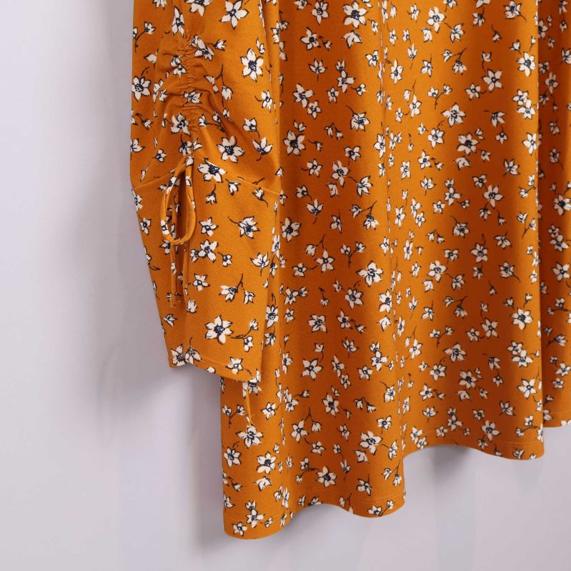 Närbild av Mango-märket