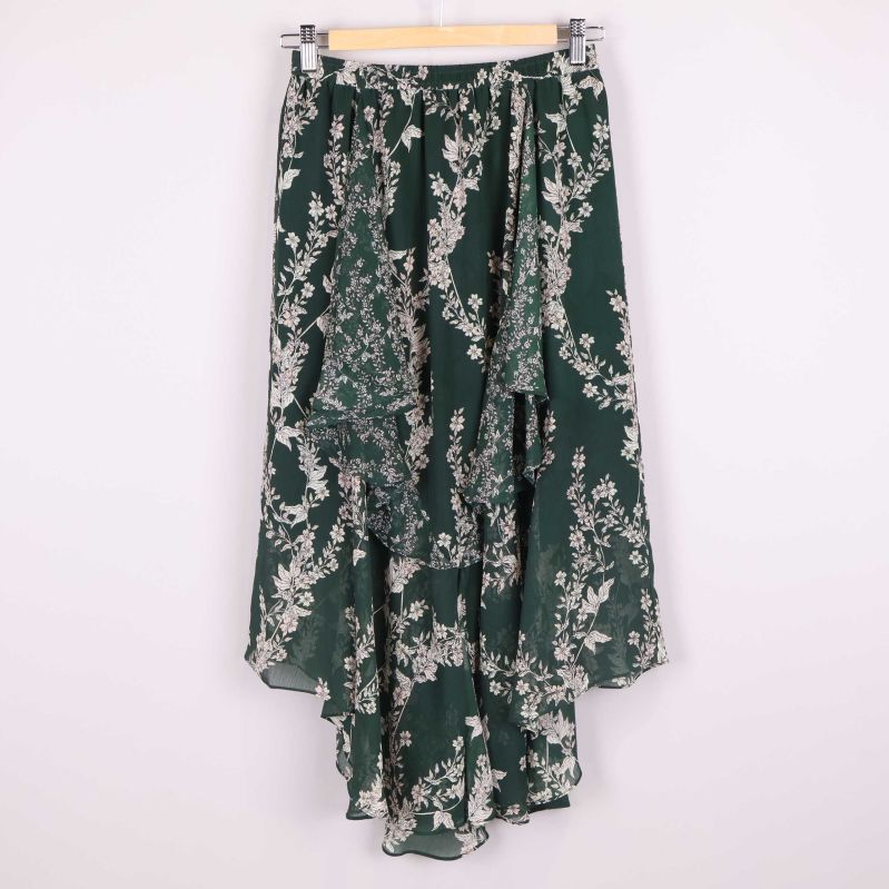 Framsida med volangdetaljer