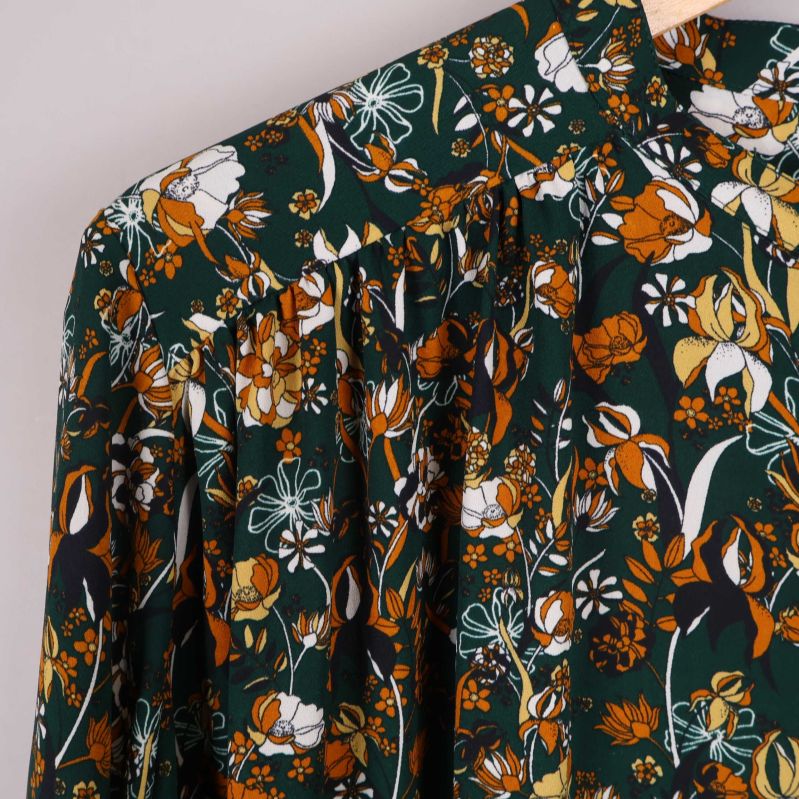 Axeldel med rynk och mönster