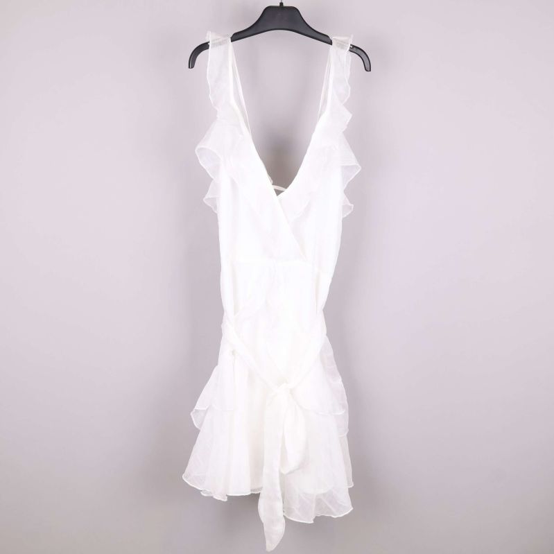 Vit klänning med volanger