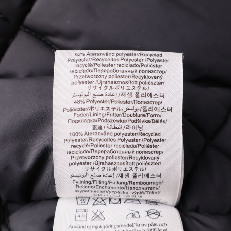 Materialetikett som visar återvunnen polyester