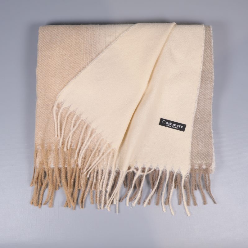 Vikbar halsduk i cashmere med fransar i beige toner