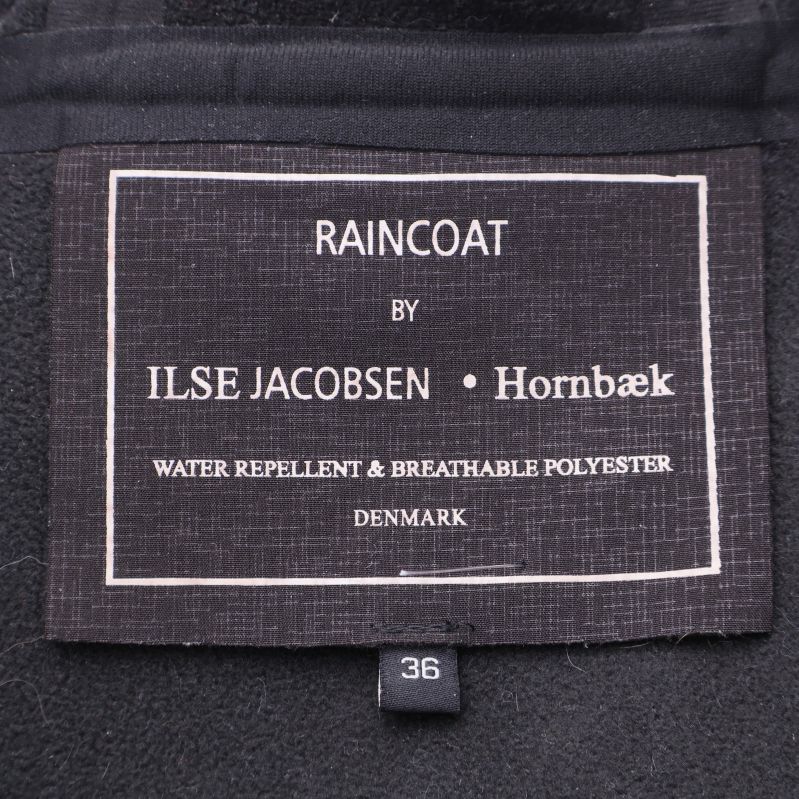 Regnjackans märkesskylt Ilse Jacobsen Hornbæk storlek 36