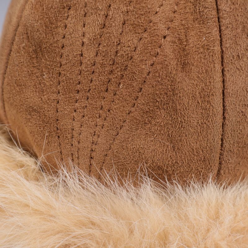 Närbild på mockans textur och den ljusa pälskanten