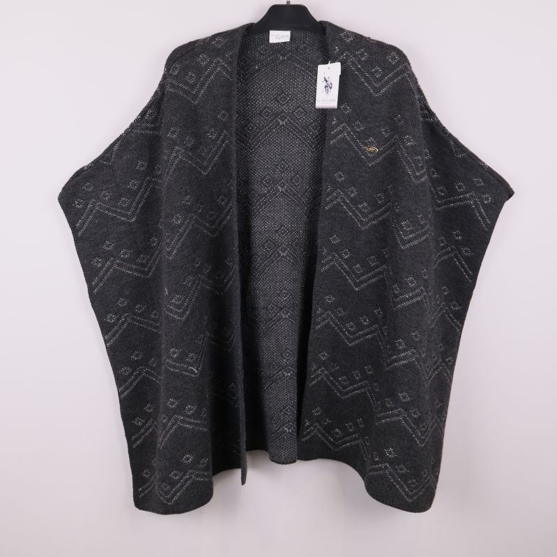 Poncho i svart och grått med grafiskt mönster framifrån