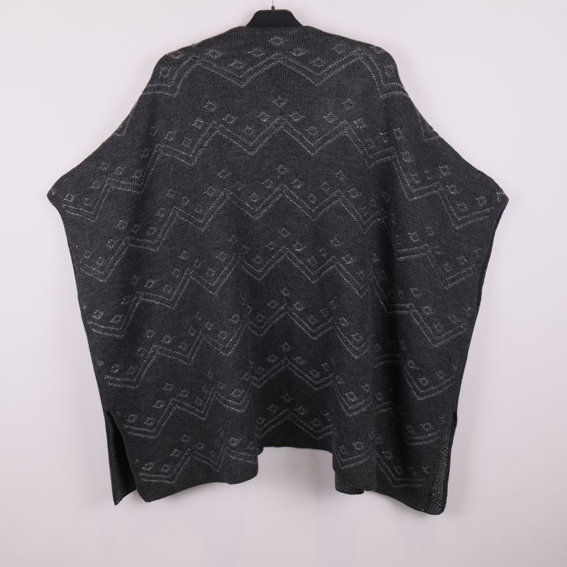 Ponchons ryggparti med geometriskt mönster i grå toner