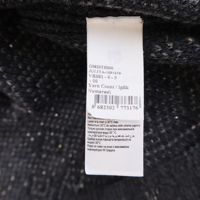 Innerlapp med ytterligare produktinformation och tvättråd