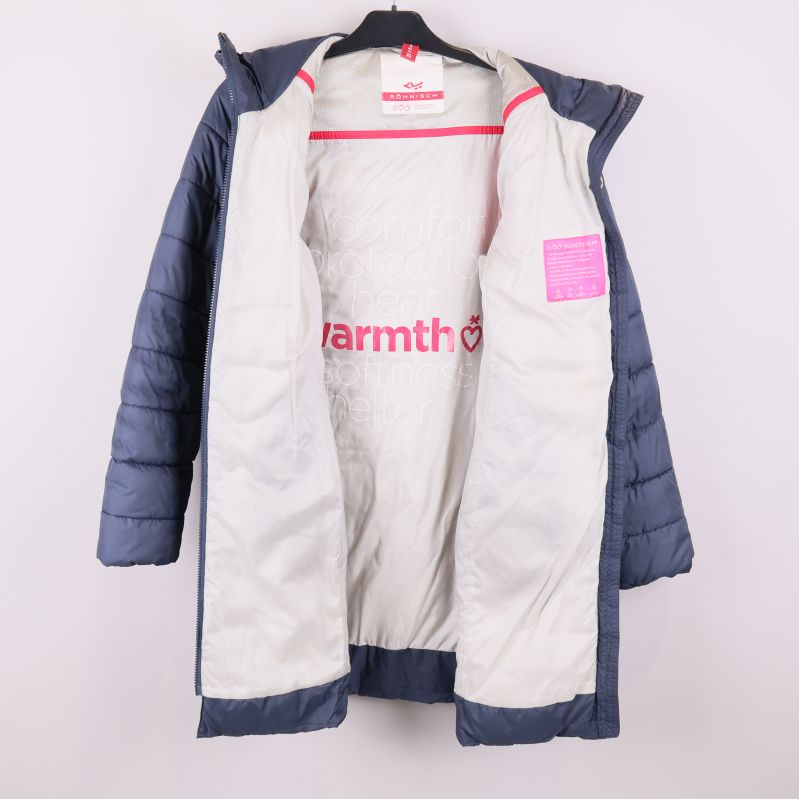 Insida av jacka med ljus fodring och texten warmth