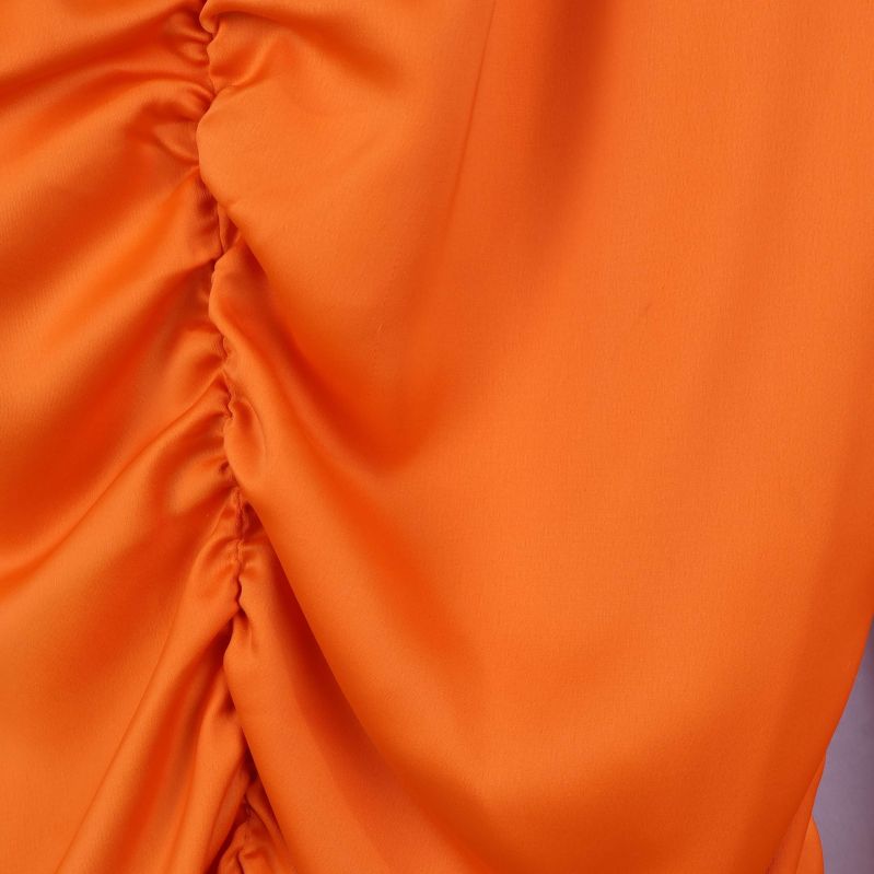 Materialdetaljer av blus