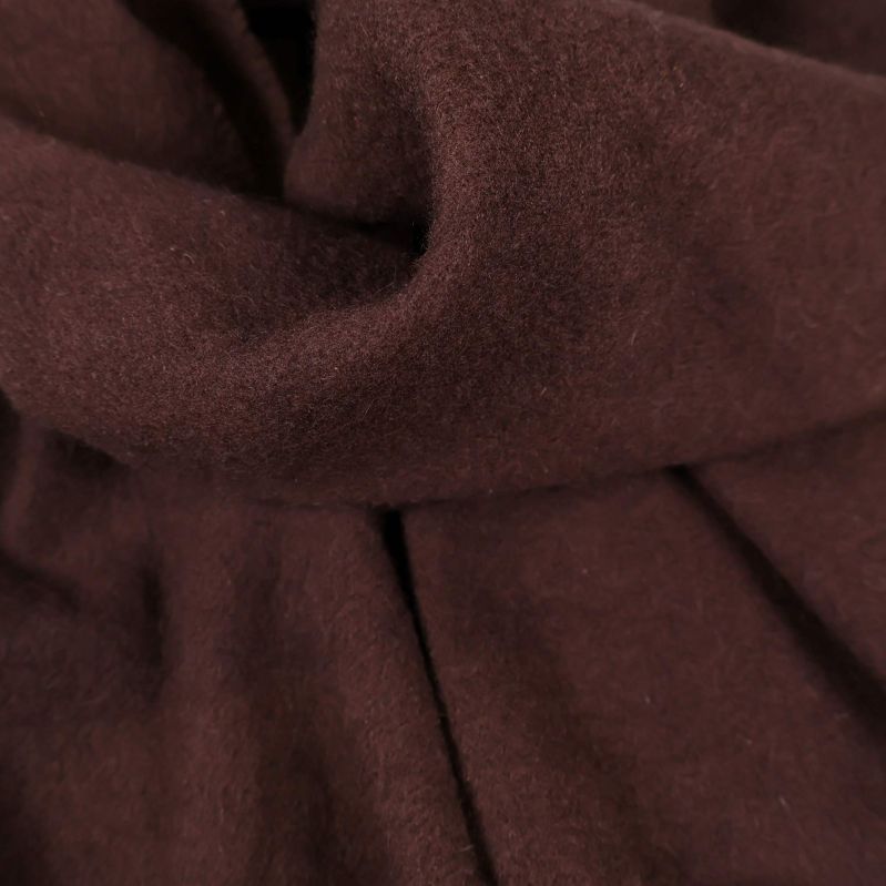 Närbild på materialets yta i brunt