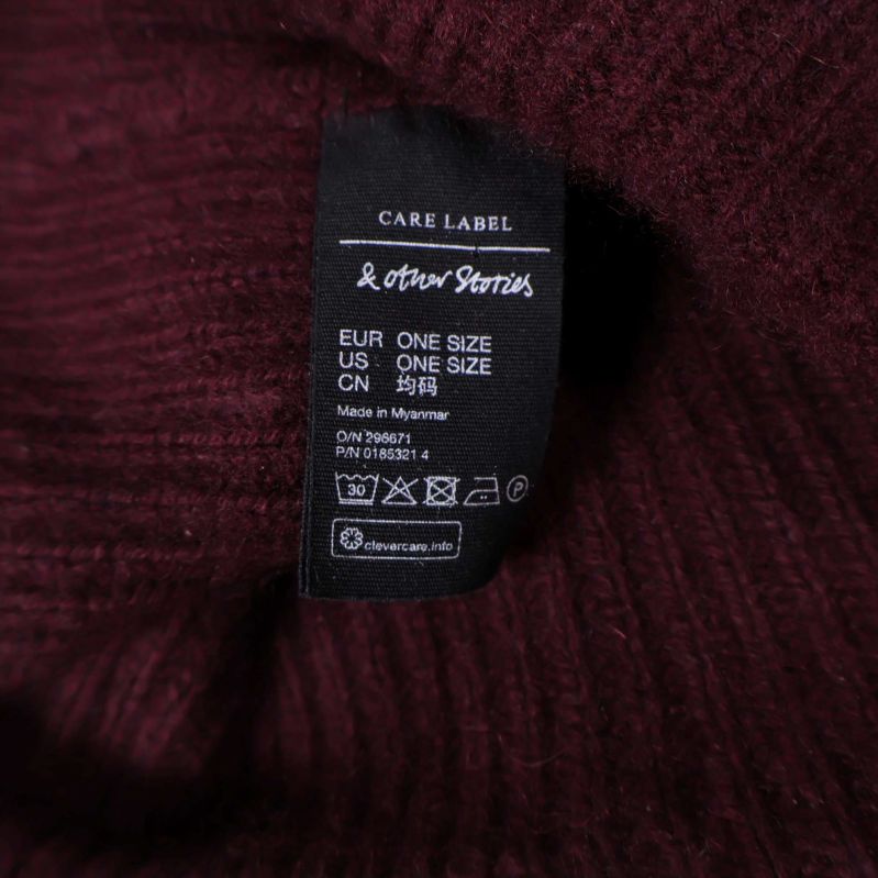 Mössa etikett från & Other Stories, onesize och skötselråd