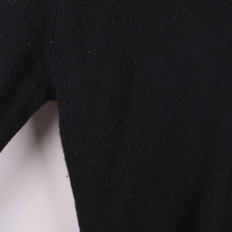 Materialets struktur i svart kashmir visas i närbild