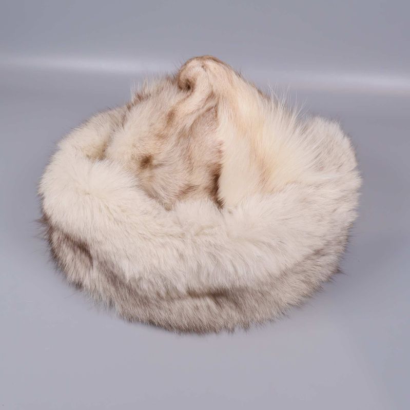 Pälsmössa rund form i pälsmaterial