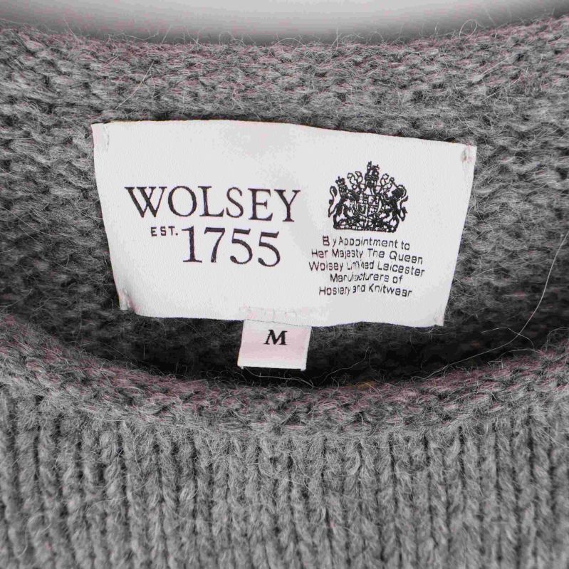 Närbild på märkning Wolsey etikett och storlek M