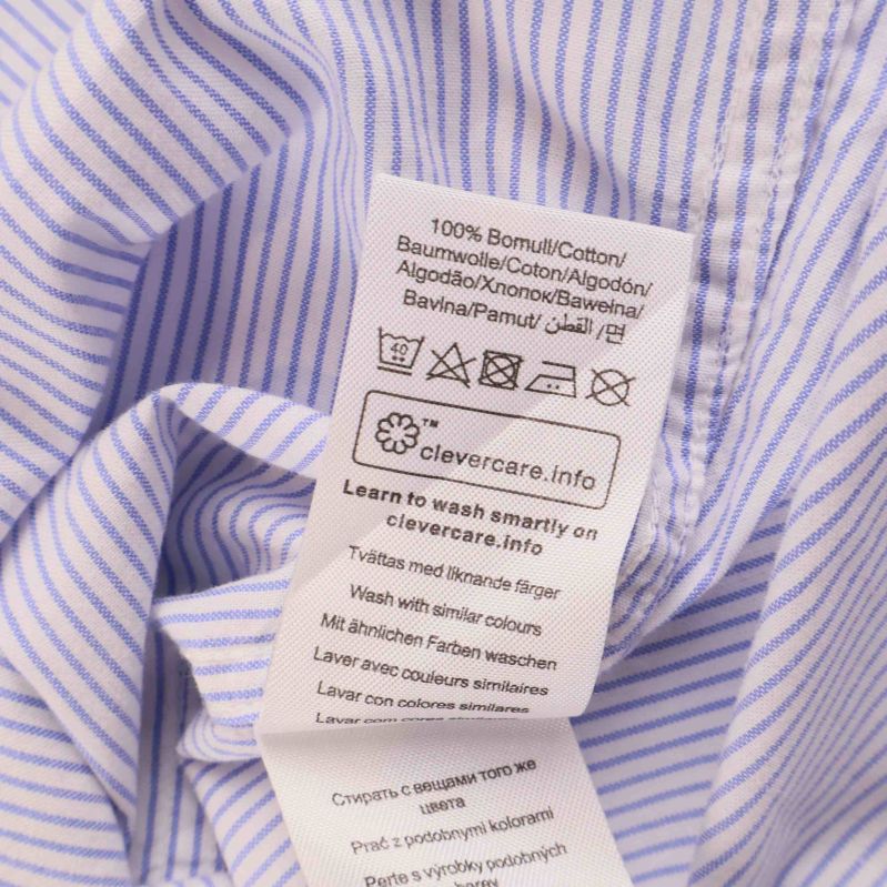 Närbild på materiallapp som visar 100% bomull