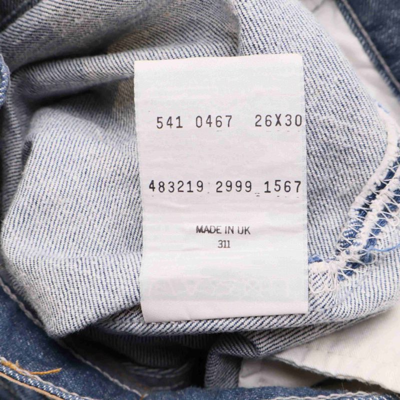 Storleksetikett i jeans med text 26x30