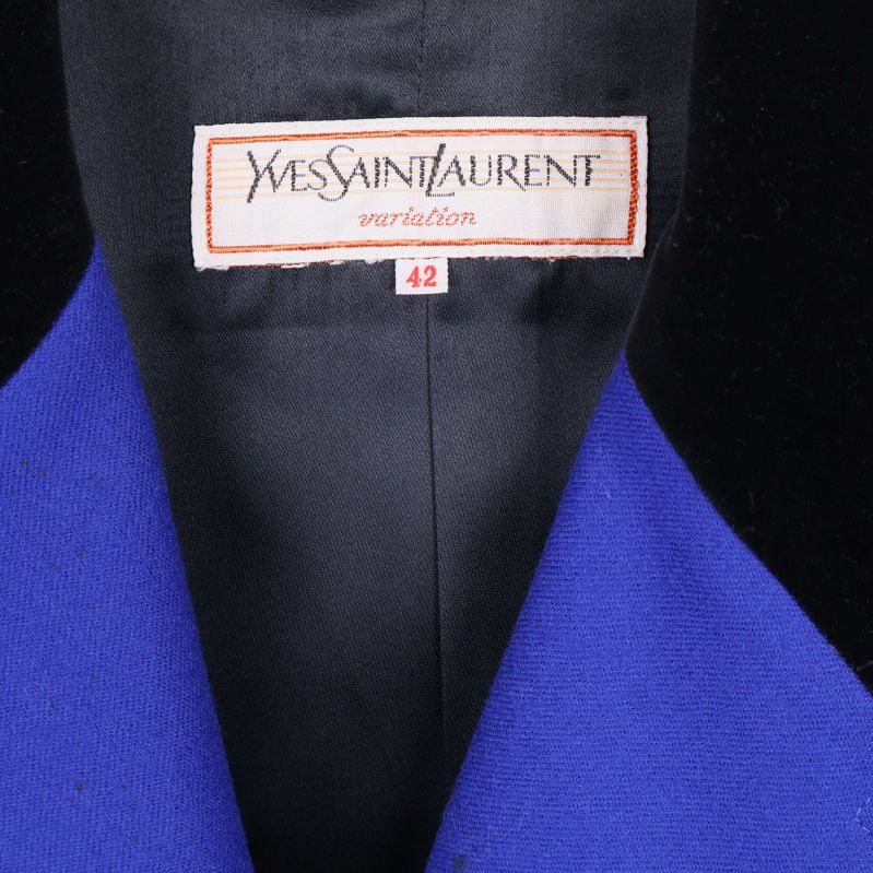 Yves Saint Laurent-etikett med storlek 42 i kavajen