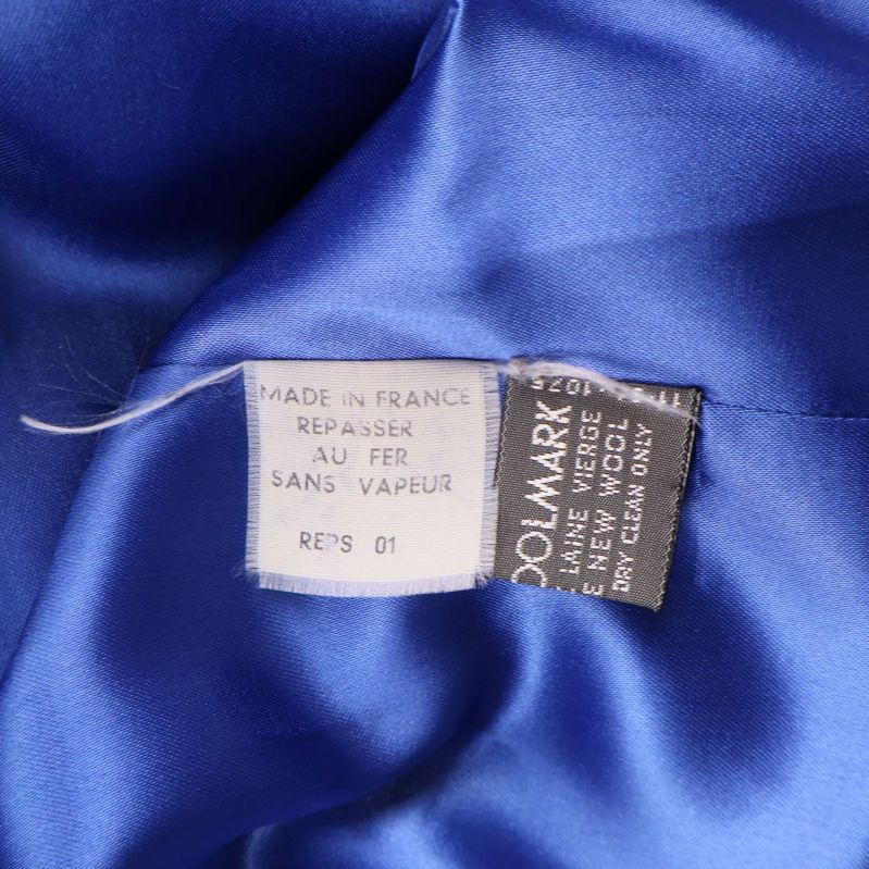 Inneretiketter med tillverkningsinformation och ullmärke