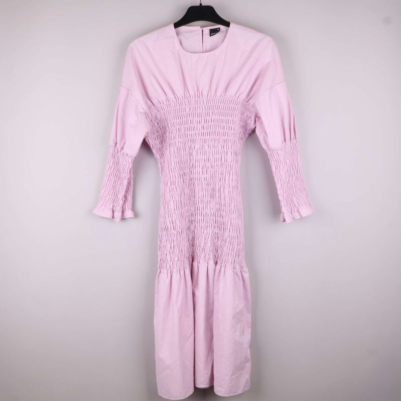 Framifrån med smockdetaljer