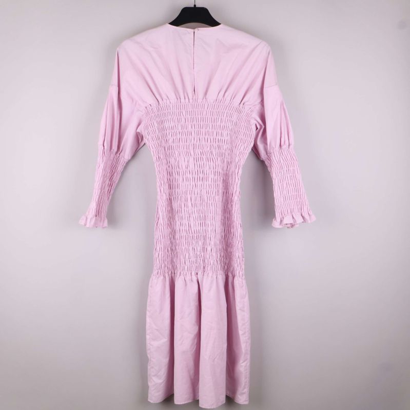 Bakifrån med smockdetaljer