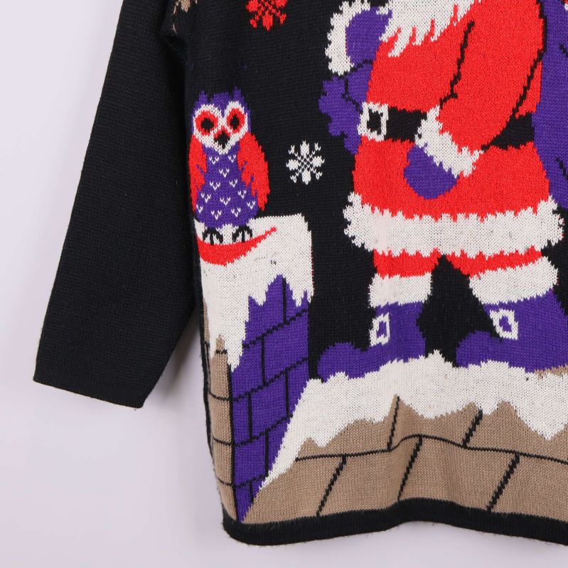 Stickad tröjas nedre del med uggla och hustaksmönster