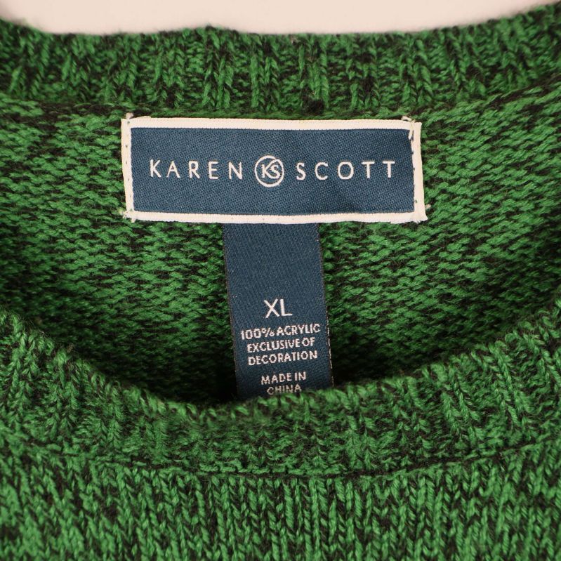 Närbild på etikett med Karen Scott och materialinformation