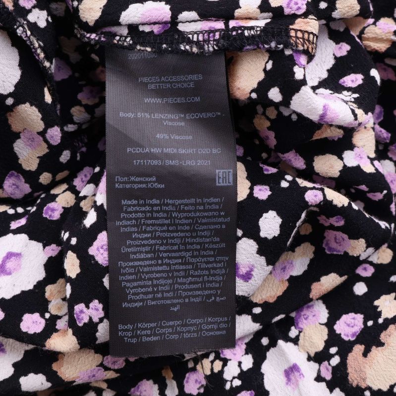 Material- och tvättrådetikett