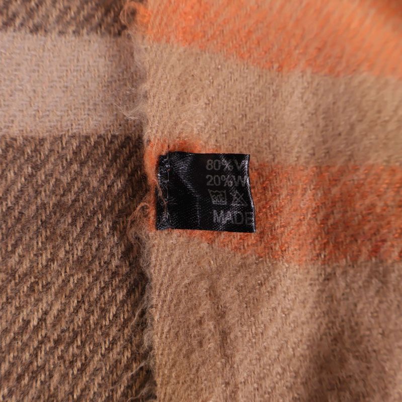 Materiallapp visar 80% viskos, 20% ull