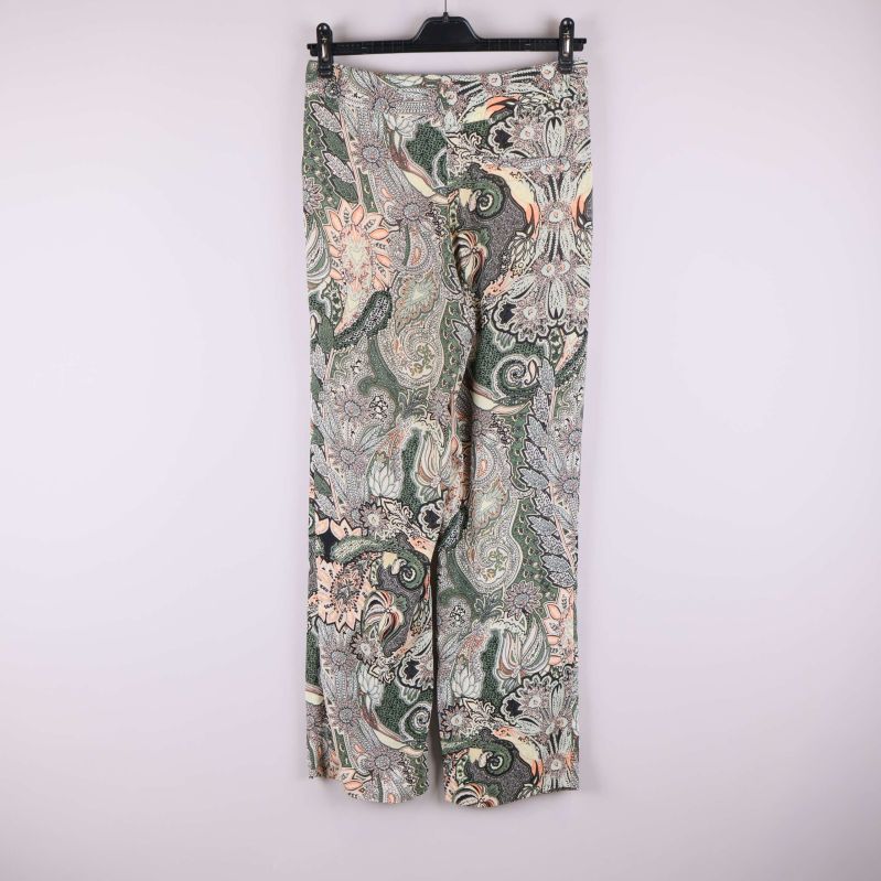 Paisleymönstrade byxor med brett ben visade bakifrån