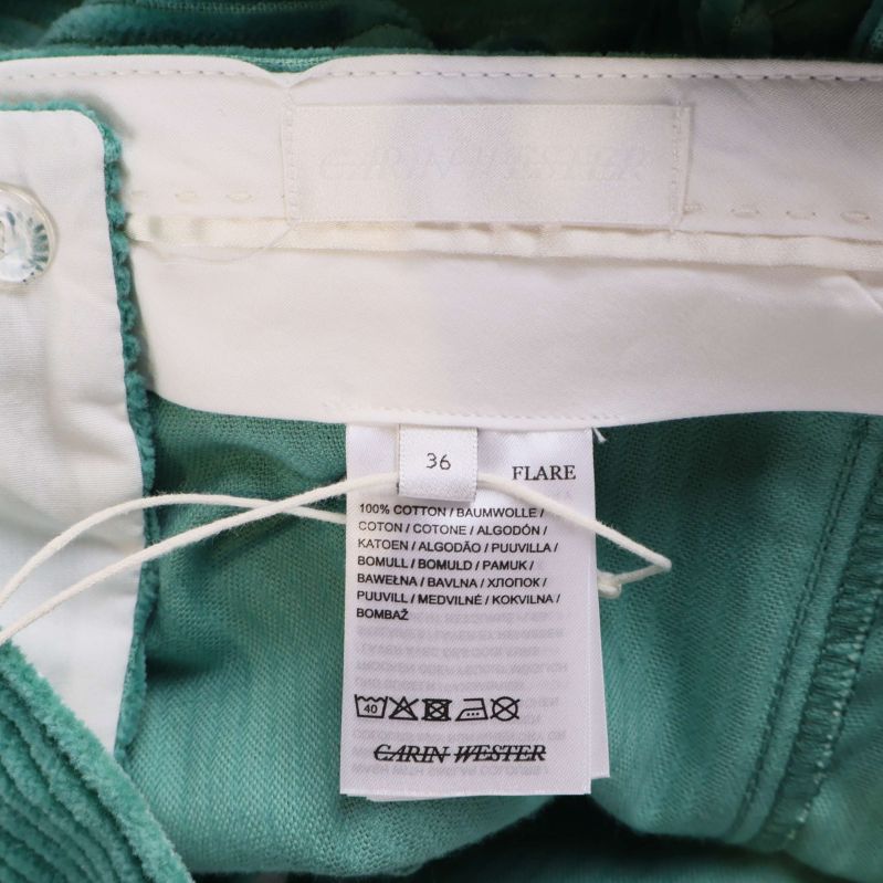 Tvätt- och materiallapp inuti byxorna med storleksangivelse